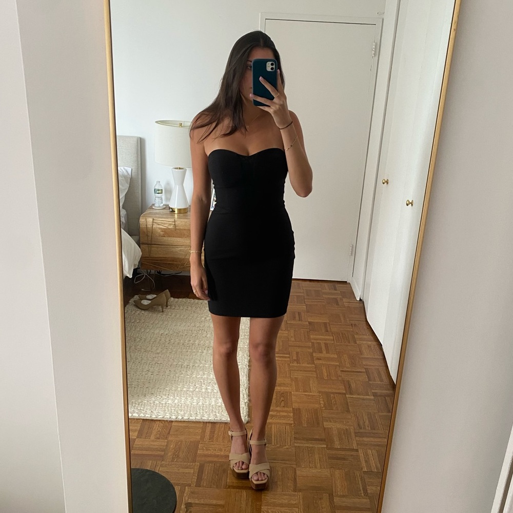 Tight strapless black dress